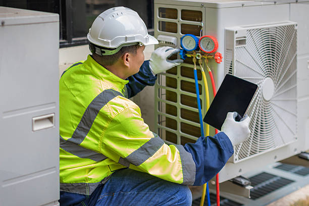 Professional Air Conditioning Repair technician working in New Munster, WI